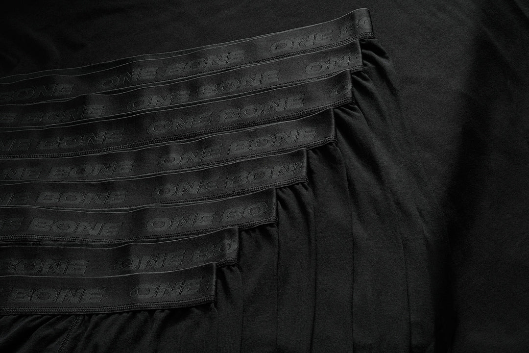 ONE BONE model wearing the Bullet Tee